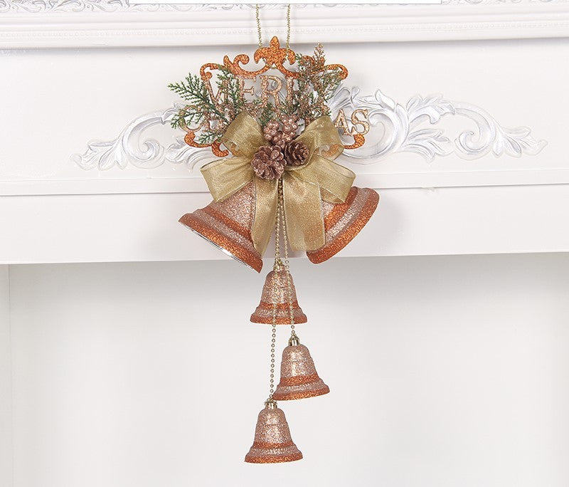 Kerst bel krans – goud/bronze met strik, dennegroen en “MERRY” topper, vier hangende belletjes – haarddecor